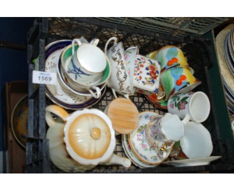 A quantity of cabinet cups and saucers, part art deco teaset, souvenir teapot, oriental style trinket pot, Portmeirion mug, s