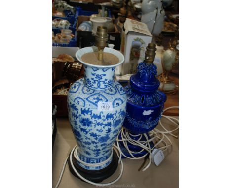 Two ceramic Table Lamps - one oriental style, the other in cobalt blue with applied floral decoration.