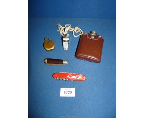 A Hapion whistle, two penknives, cased hip flask and a brass lighter with can surround