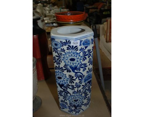 A blue and white oriental stick stand, hexagonal shape, 17 3/4" tall.