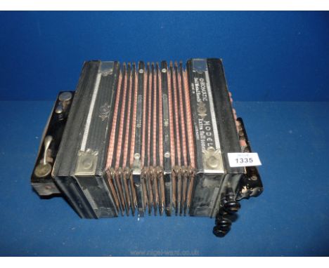 A German made accordion, a/f