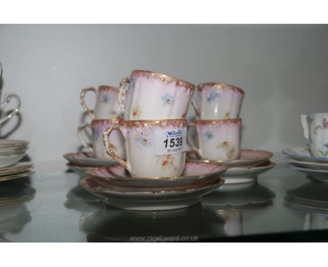 A Limoges coffee set, six cups and saucers.