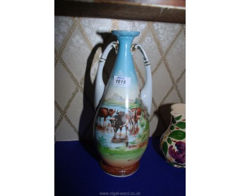 A vintage hand painted two handled ceramic vase with cattle in lakeside water and trees with foliage around, 14'' high.
