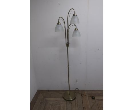 Brushed gilt finish modern standard lamp with three opaque glass shades and floor switch (height 164cm) and a matching table 