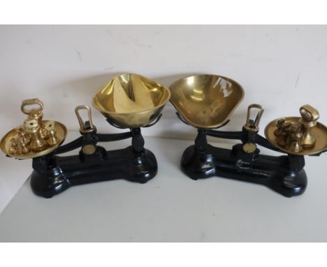 Two pairs of Librasco Libra scale company scales with brass pans and weights 