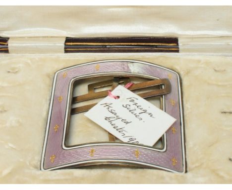 		A Continental Guilloche enamel and silver buckle asaid Chester 1909. Retailed by the goldsmiths and silversmiths company. M