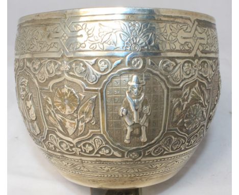 		A silver bowl by Hunt & Roskell, Late Storr & Mortimer. Repousse decorated and chased with Eastern scenes and bands of trai