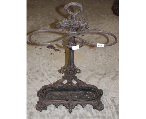 		A Victorian cast iron stick stand in the manner of Coalbrooke Dale. 29' high