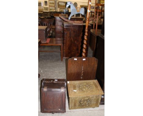 		An oak barleytwist lamp standard, a firescreen, a brass embossed coal box and an oak coal box
