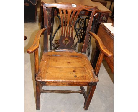 		A George III country commode armchair 