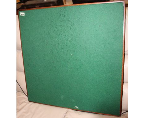 		A folding card table with green base top 