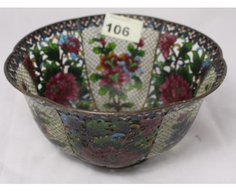 		A chinese plique-a-jour bowl finely decorated in coloured enamels with flowers and foliage. 7 1/4' diam. C.R. Minor losses 
