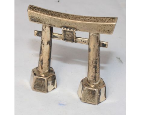 		A Japanese silver model of a temple gate. Stamped stirling. 2 1.4' high. C.R. All good