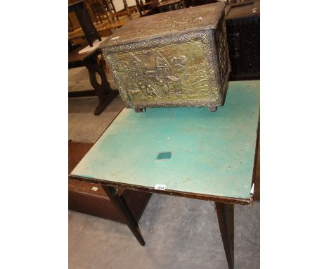 		A folding card table with green baise top together with an embossed brass log box