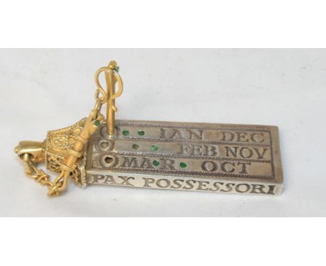 		A silver and silver gilt pocket sundial probably by Lesley Durbin being a replica of a 10th Century Saxon pocket sundial. A