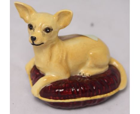 		A Beswick Chihuahua on cushion. C.R. All good