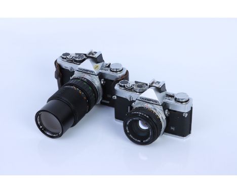 Two Olympus OM SLR Cameras, including OM-1 with Zuiko f/1.8 50mm, body, G, shutter working, lens, VG, some light internal haz