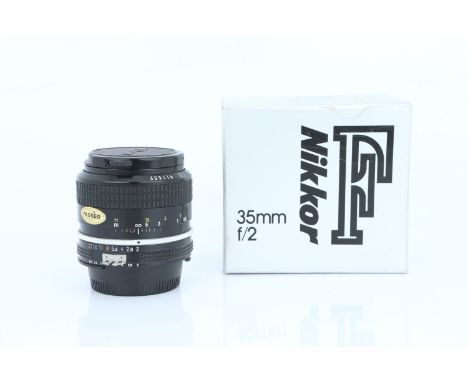 A Nikon Ai Nikkor f/2 35mm Lens, black, serial no. 911552, body, VG, elements, G-VG, one or two internal marks and light inte