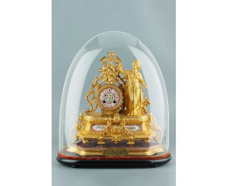 A Gilded Spelter Presentation Clock Under Glass Dome French, dated on the presentation plaque 1895, dial signed 'HRY MARC PAR