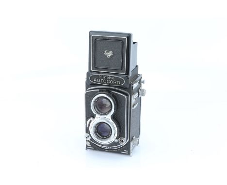 A Minolta Autocord TLR Medium Format Camera, with Chiyoko Rokkor f/3.5 75mm lens, body, G-VG, shutter working, slow speeds st