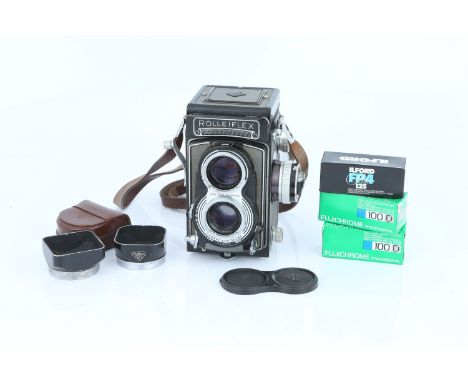 A Rollei Rolleiflex 3.5 T TLR Camera, grey, serial no. 2120052, with Carl Zeiss Tessar f/3.5 75mm lens, body, G-VG, shutter f