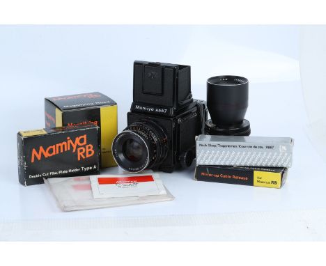 A Mamiya RB67 Professional Medium Format Camera, with Mamiya-Sekor f/3.8 90mm lens, body, VG, shutter working, lens, VG, toge