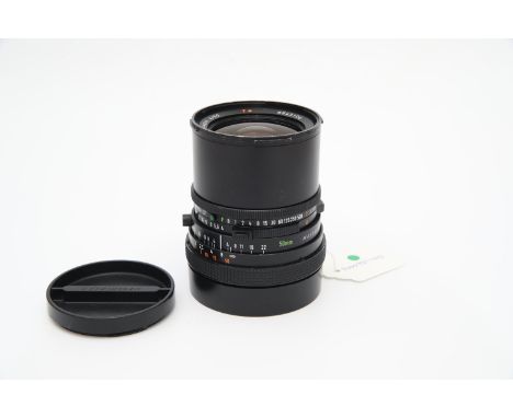 A Carl Zeiss Distagon T* f/4 50mm Lens, black, serial no. 6543106, body, G, shutter not working, elements, F, some light inte