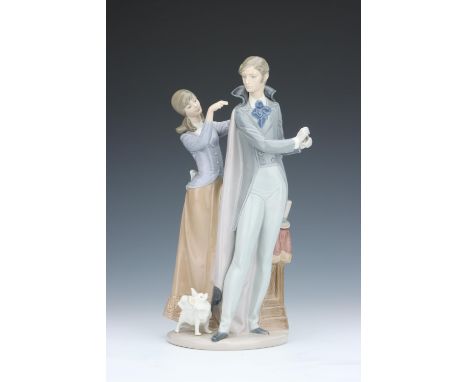 A Lladro Figure of a Gentleman &amp; Lady, with a small dog to lower, marked to base '25S 6-X', some damages to fingers