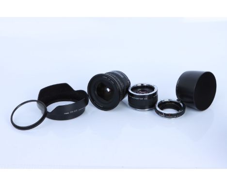 A Canon EF f/3.5-4.5 20-35mm Lens, body, G, untested, elements, VG, some light internal haze, together with Canon Extension T