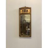 A French brass pier glass, width 23cm, height 57cm. Condition - fair