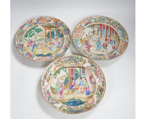 Three early 19th century Chinese famille rose soup plates, 25.5m diameter All structurally good.  One plate with two flakes t