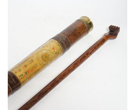 An inscribed cocus wood walking stick with carved handle in the form of a hand, ‘Pitcairn Island’ and a brass mounted two dra
