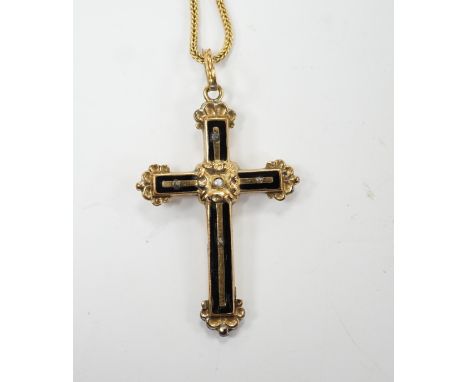 A yellow metal, black enamel and seed pearl set cross pendant, 30mm, on a yellow metal fine link chain, 38cm, gross weight 4.