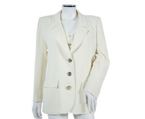 A vintage Yves Saint Laurent variation lady's off white three piece trouser suit with skirt (four pieces), F 40 (UK 12). Proc