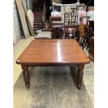 A late Victorian oak extending dining table, with three spare leaves, width 290cm extended, depth