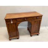 An early Victorian mahogany kneehole dressing table, width 107cm, depth 48cm, height 79cm. Condition