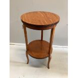An Edwardian circular satinwood two tier occasional table, diameter 38cm, height 70cm. Condition -