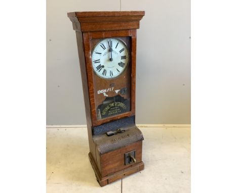 A National Time oak cased recorder, clocking-in clock, height 110cm. Condition - fair Condition Report The clock movement is 