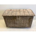 An Indian iron bound domed hardwood trunk, width 104cm, depth 62cm, height 71cm. Condition - poor