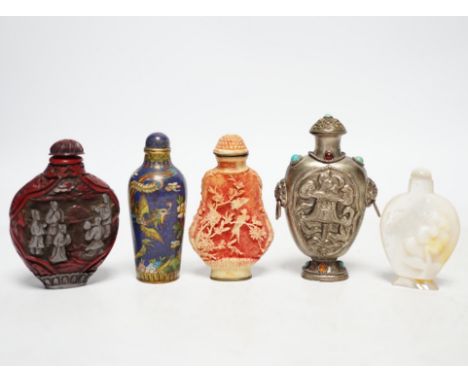 A Chinese cloisonné enamel snuff bottle, two resin snuff bottles, a carved mother of pearl snuff bottle and a Tibetan style m