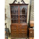 A George III mahogany secretaire chest, fitted with a later glazed two door bookcase, width 112cm,