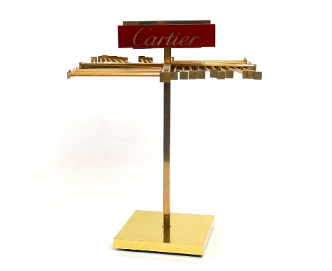 A Cartier vintage scarf rack.