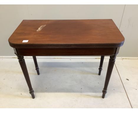 A Regency mahogany folding card table, width 92cm, depth 46cm, height 76cm.  Condition - fair
