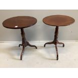 A near pair of Victorian circular mahogany tripod wine tables, larger diameter 57cm, height 71cm.