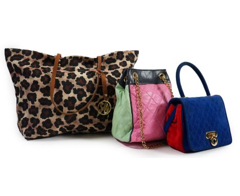 A selection of lady's handbags, including an animal print Stuart Weitzman shoulder bag with dust bag, an Escada suede royal b