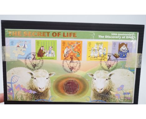 A quantity of assorted modern first day cover commemorative coins to include 2002 United Kingdom Brilliant Uncirculated Coin 