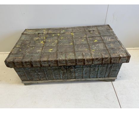 An Indian iron bound hardwood trunk, width 128cm, depth 73cm, height 48cm.  Condition - poor