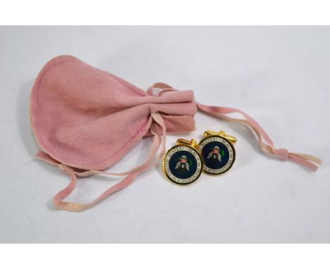 A pair of enamel cufflinks, featuring Seal of American president Ronald Reagan with facsimile signature to reverse