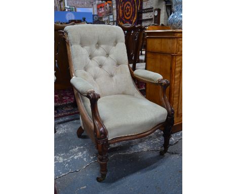 A pair of William IV open armchairs, the mahogany frames with button upholstery and raised on moulded turned front legs to ce