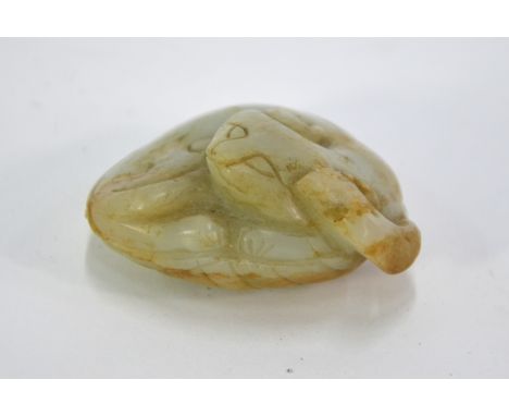 A mottled green jade carving of a coiled cat, curled up on a leaf, 5.5 cm long; post Qing DynastyThe damage includes: some ar